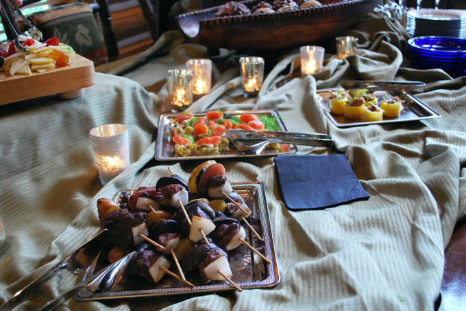 Appetizer buffets spread with candles