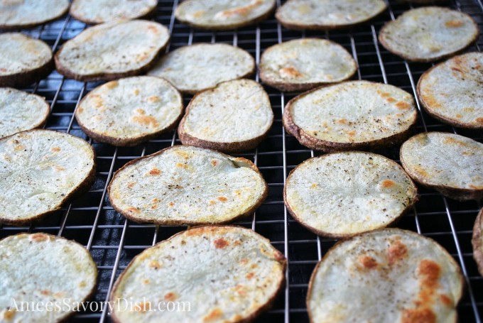 baked potato slices freshly roasted on rack