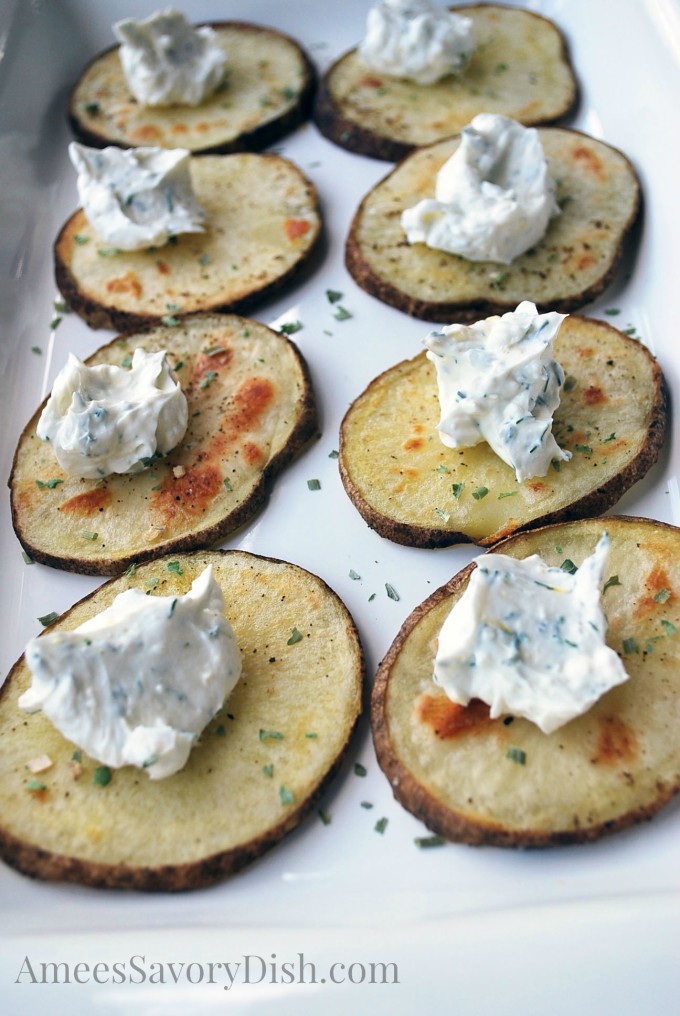 roasted potato slices topped with creamy chive sauce