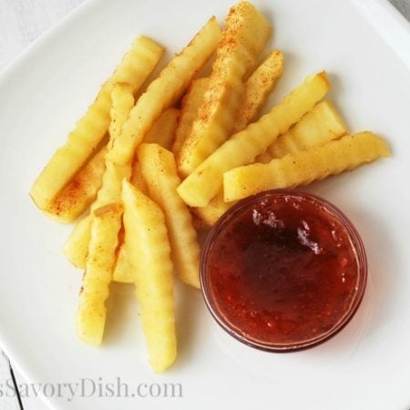 Fool Apple fries on a plate with jam