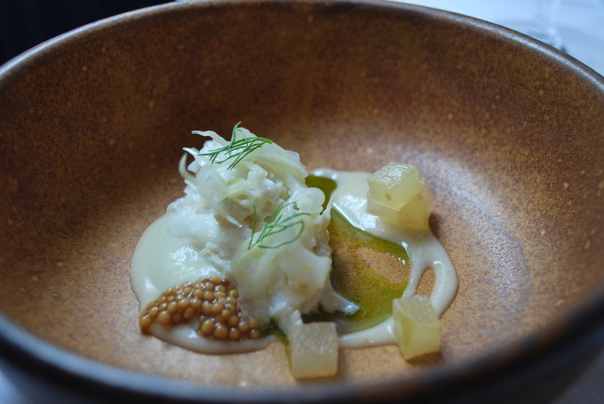 Crab salad in a wooden bowl