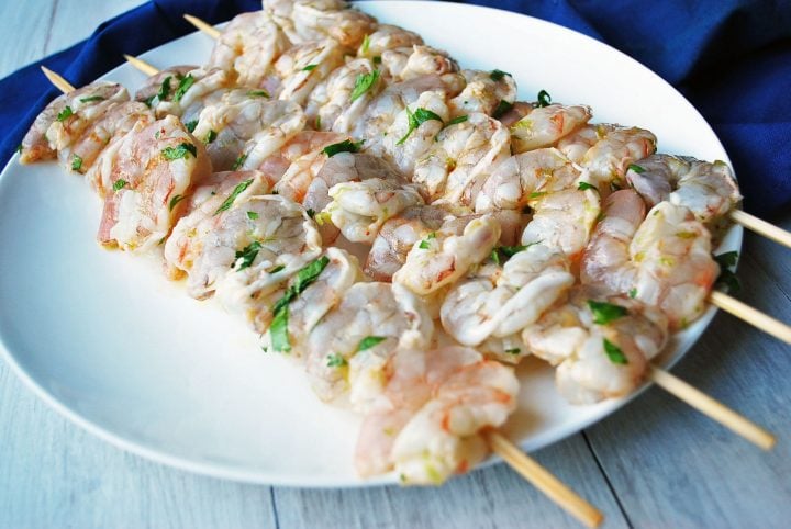 marinated shrimp ready to grill on skewers