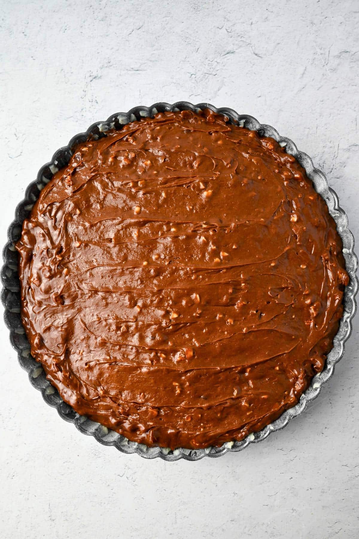 brownie batter in a tart pan