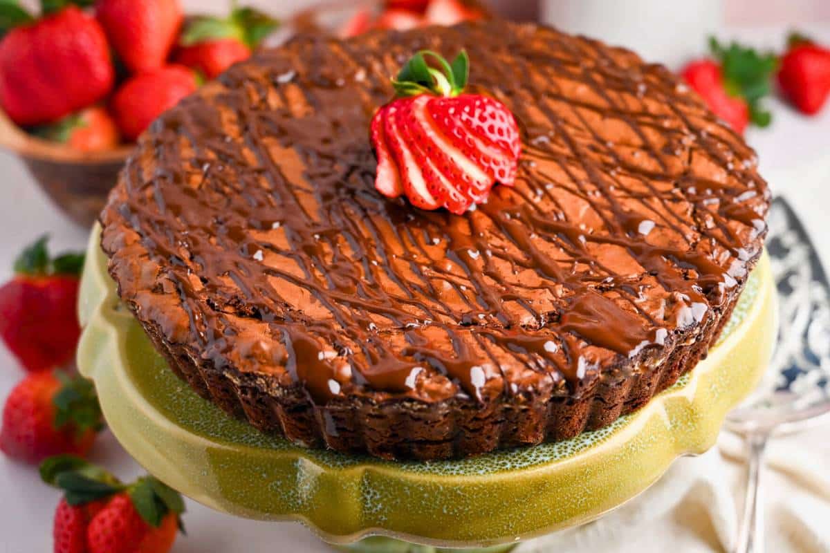 brownie tart on a cake stand