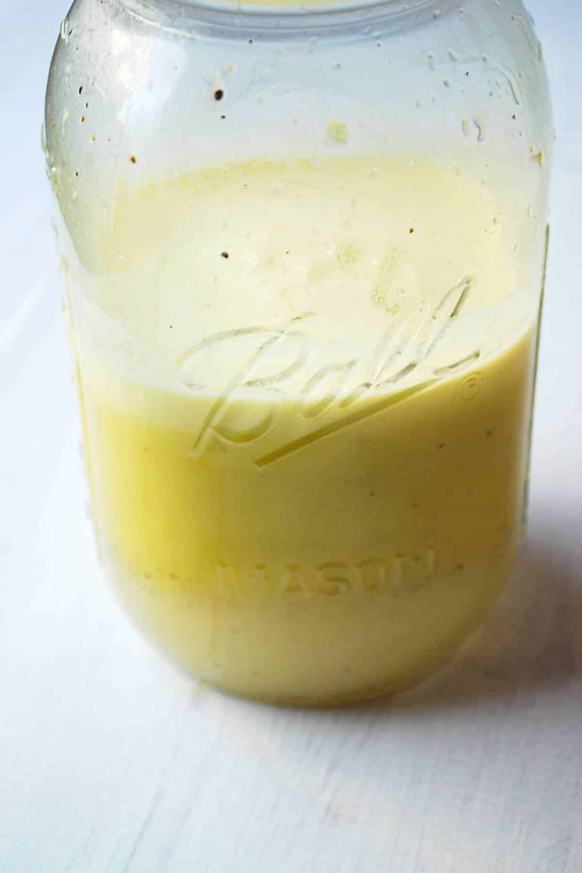 citrus lime vinaigrette dressing in a mason jar