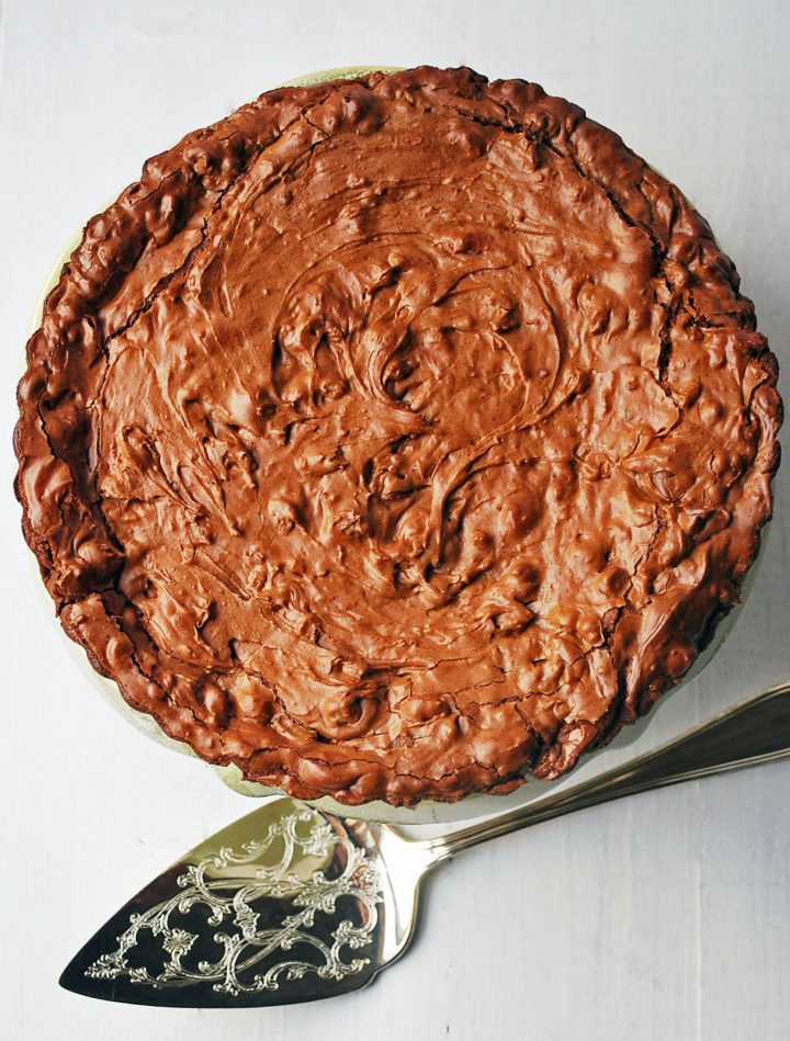 overhead shot of brownie tart with serving spatula