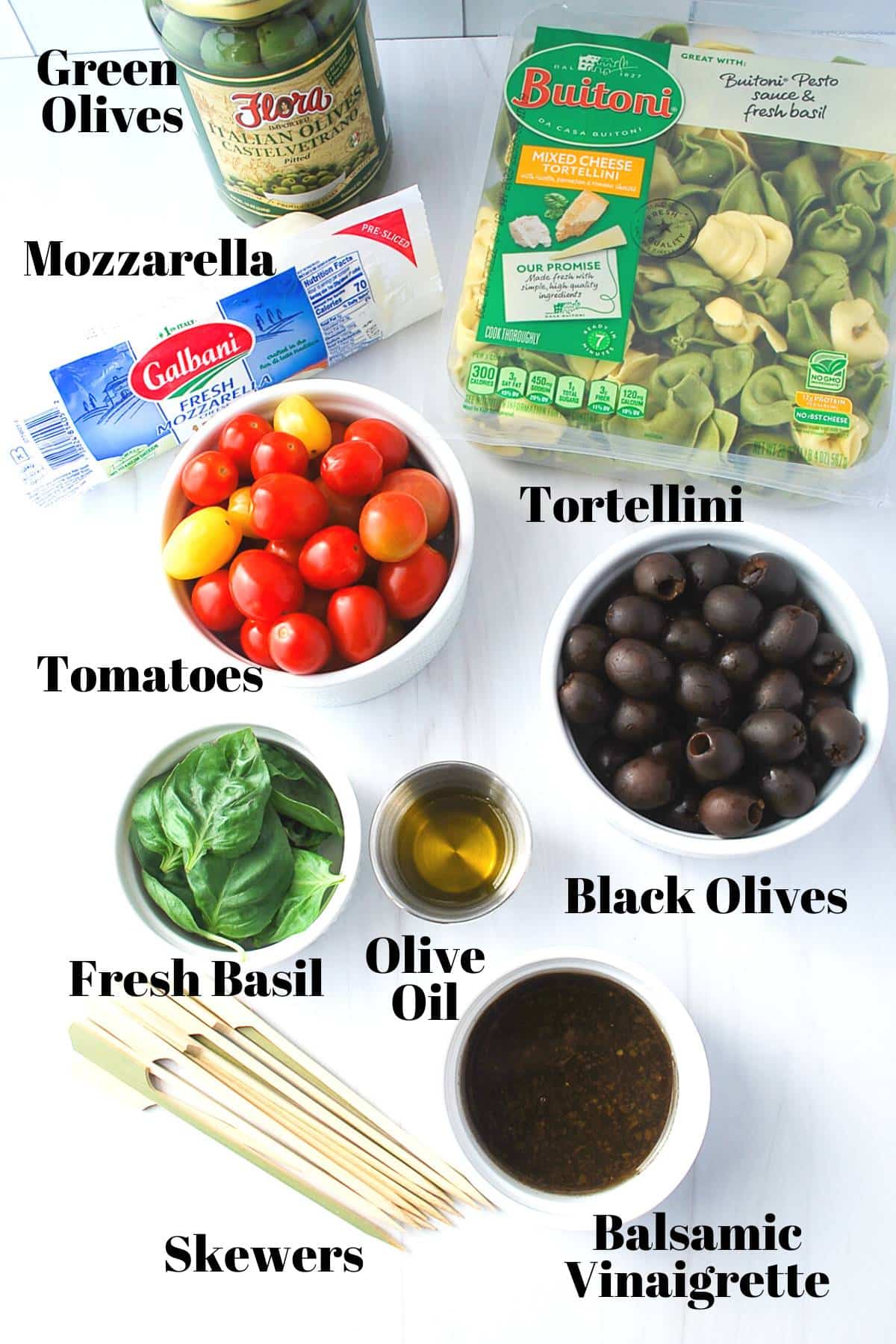 ingredients for caprese skewers on a kitchen counter