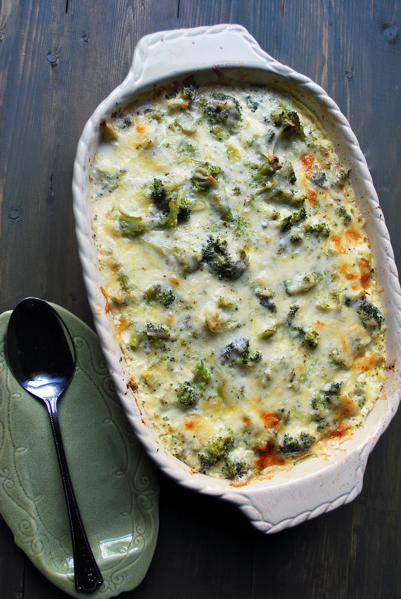 overhead photo of broccoli casserole with spoon 