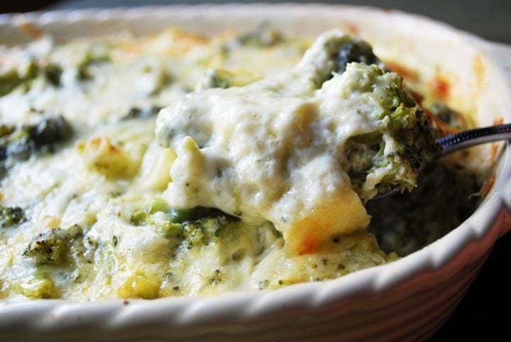 spoonful of broccoli casserole in pan