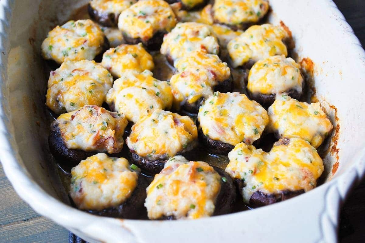 loaded potato gluten free stuffed mushrooms in a baking dish fresh from the oven