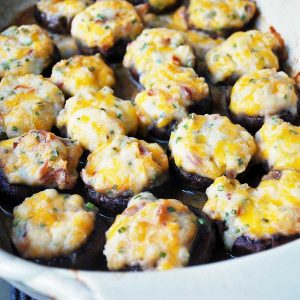 stuffed mushrooms in a casserole dish