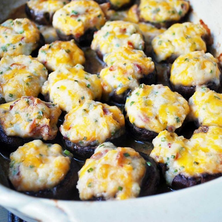 stuffed mushrooms in a casserole dish