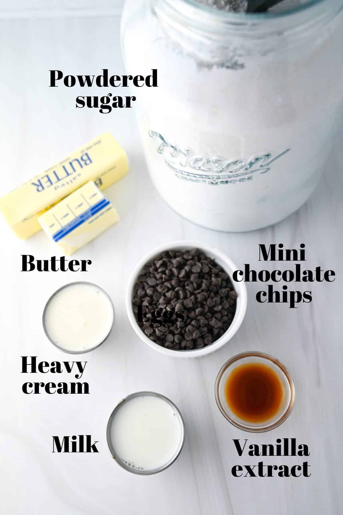 ingredients for chocolate chip buttercream frosting measured out on a counter