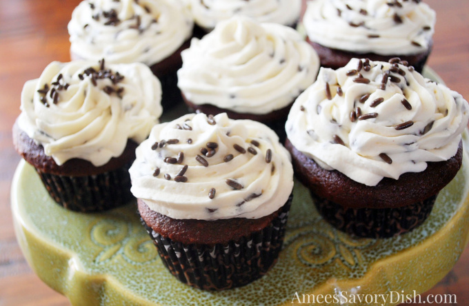 A simple recipe from scratch for super Moist Devil's Food Cupcakes with a rich and delicious chocolate chip frosting.