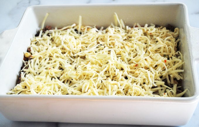 Layer of cheese in easy beef Mexican casserole