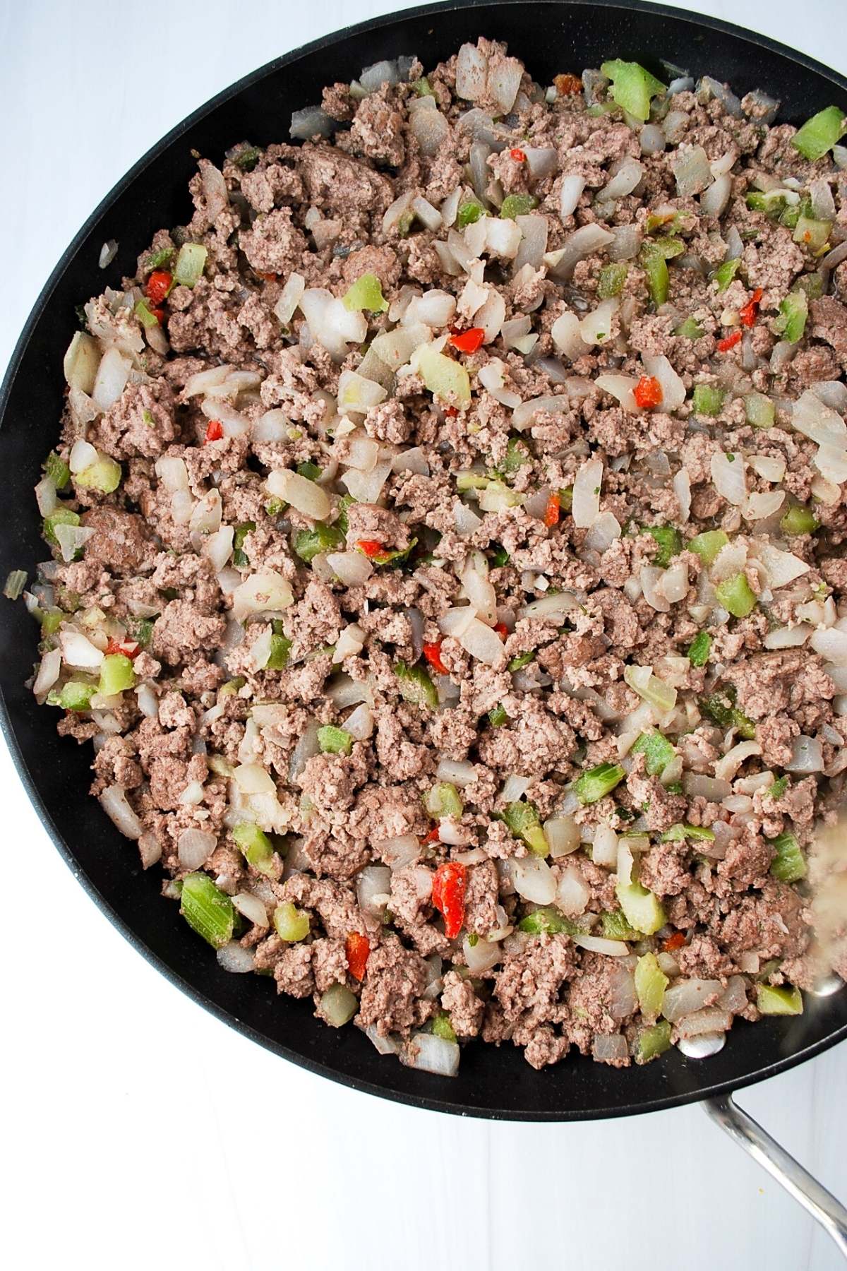 ground beef and veggies in a skillet