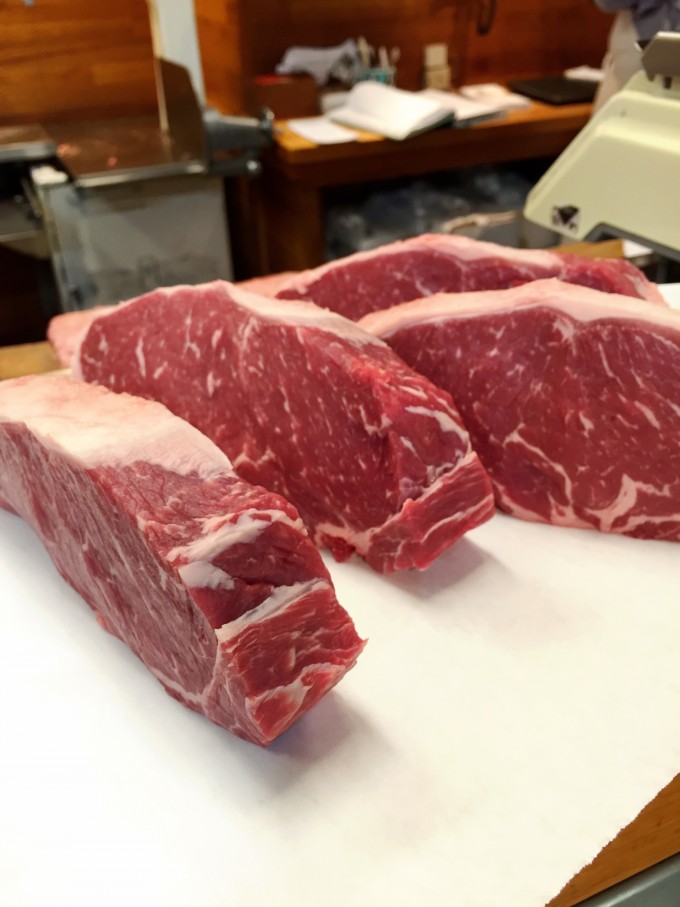 Sliced steaks on a counter