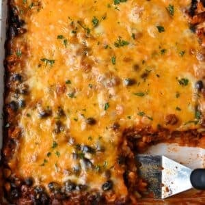 ground beef mexican casserole with a serving cut out