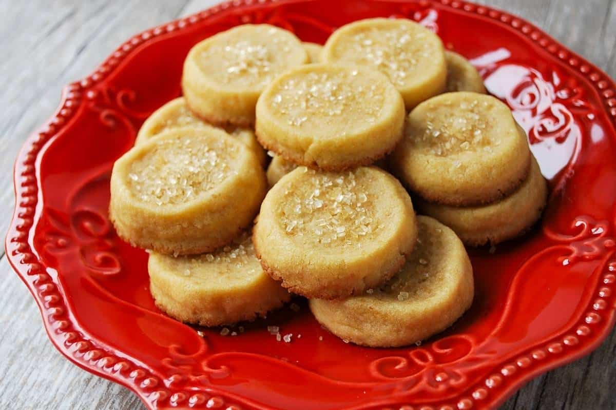 a plate of maple infused shortbread cookies with raw sugar on top