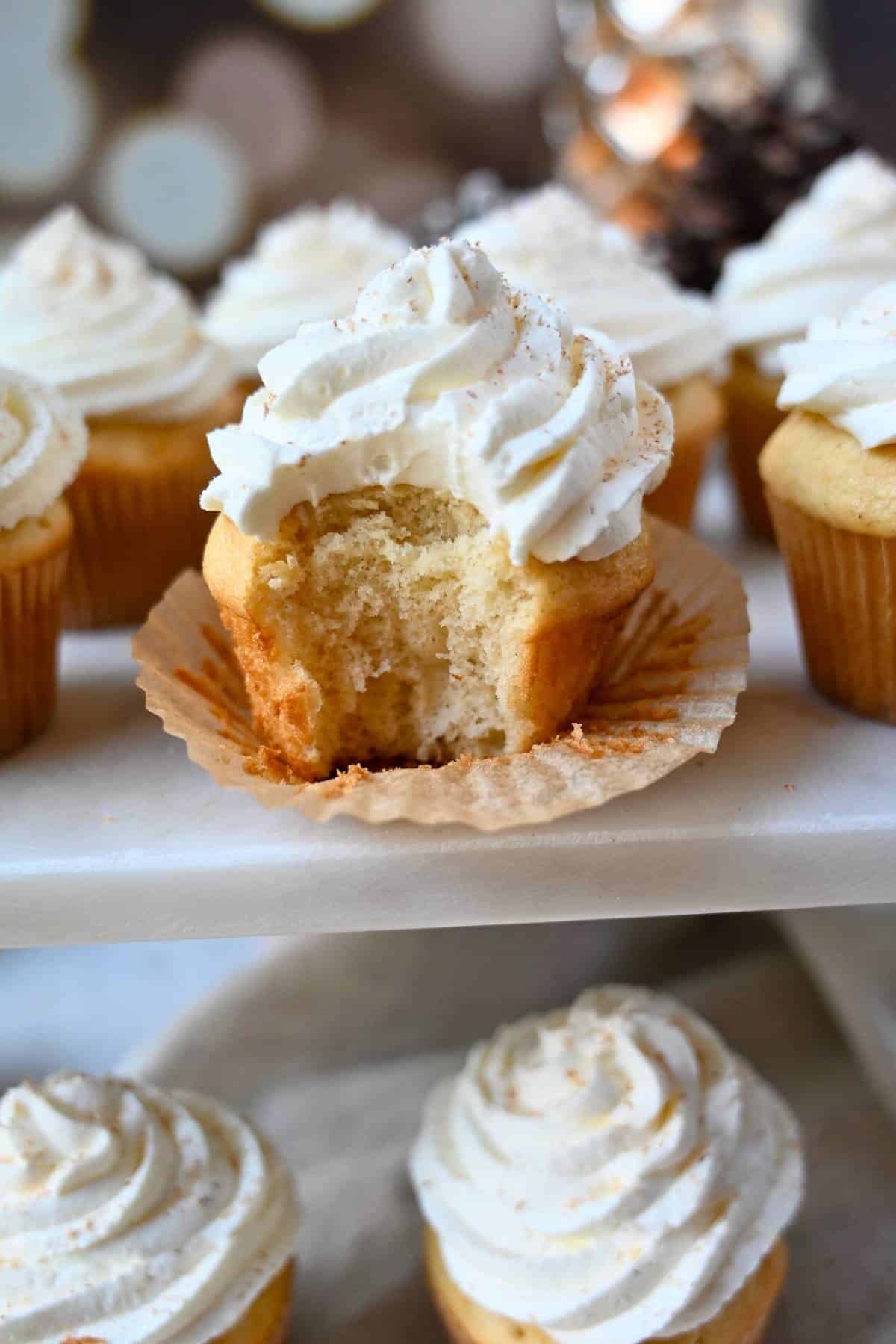 eggnog cupcakes with a bite out of one