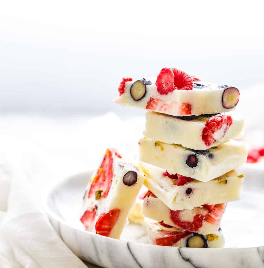 stack of frozen yogurt bars on a plate