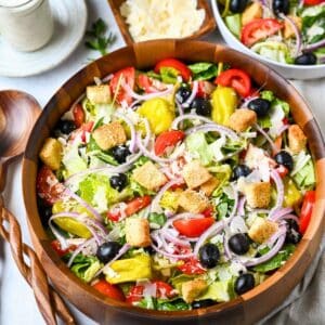 a large bowl of copycat olive garden salad