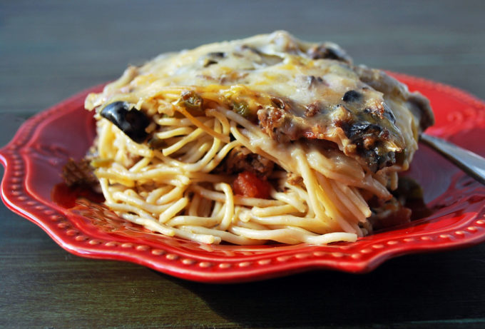 plate of baked spaghetti casserole with a fork