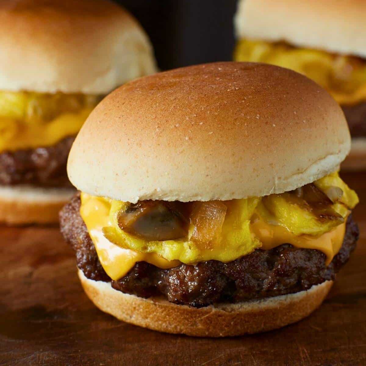 3 breakfast beef sliders on a plate