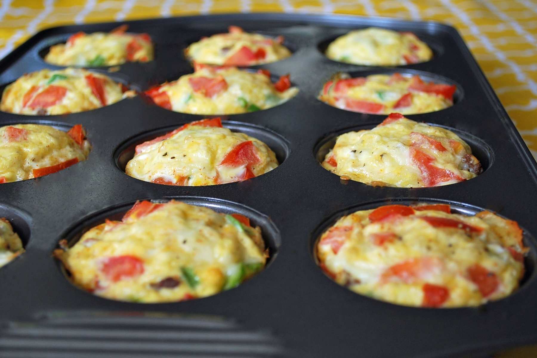 close up of egg muffins in a cupcake pan