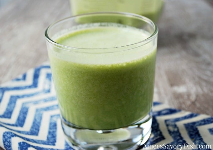 A close up of a beverage in a glass cup on a table