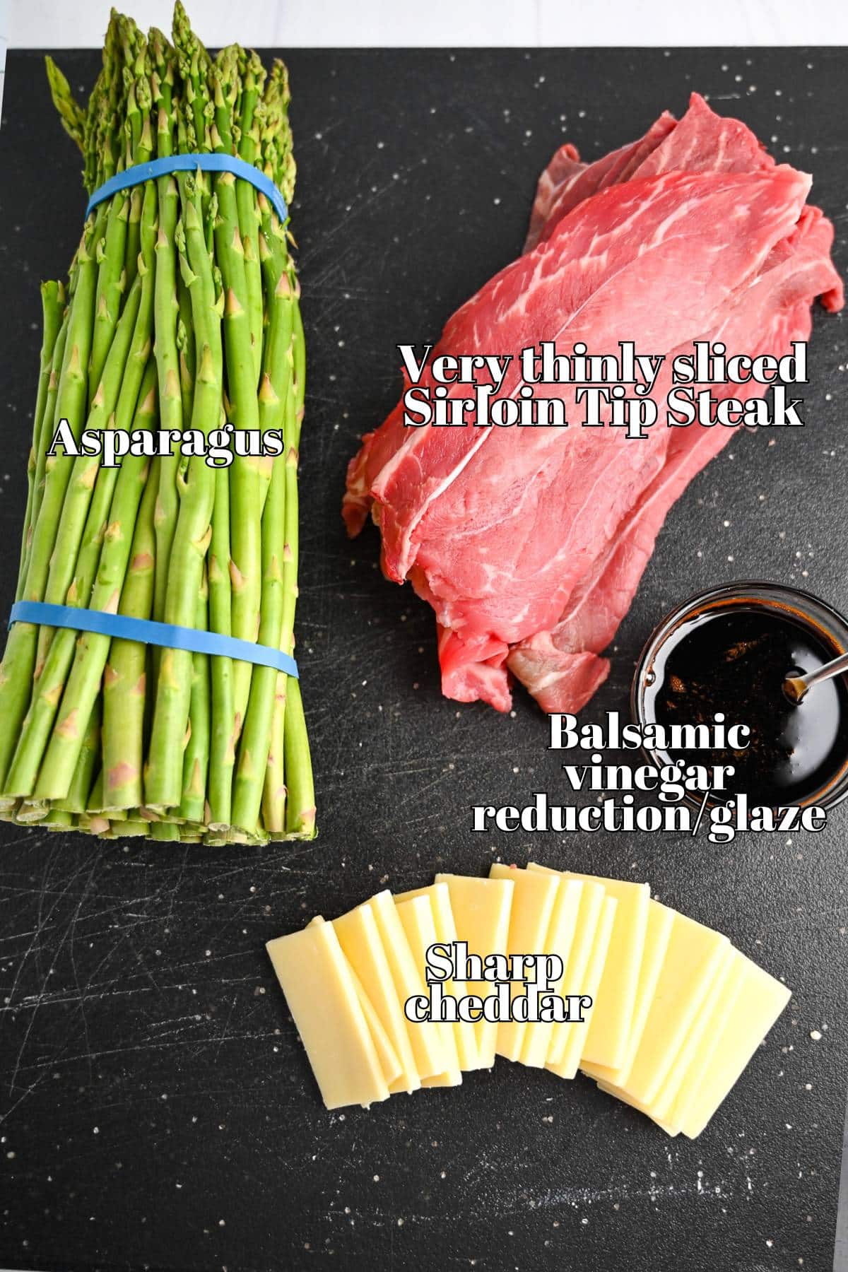 ingredients for making steak rolls measured on a cutting board