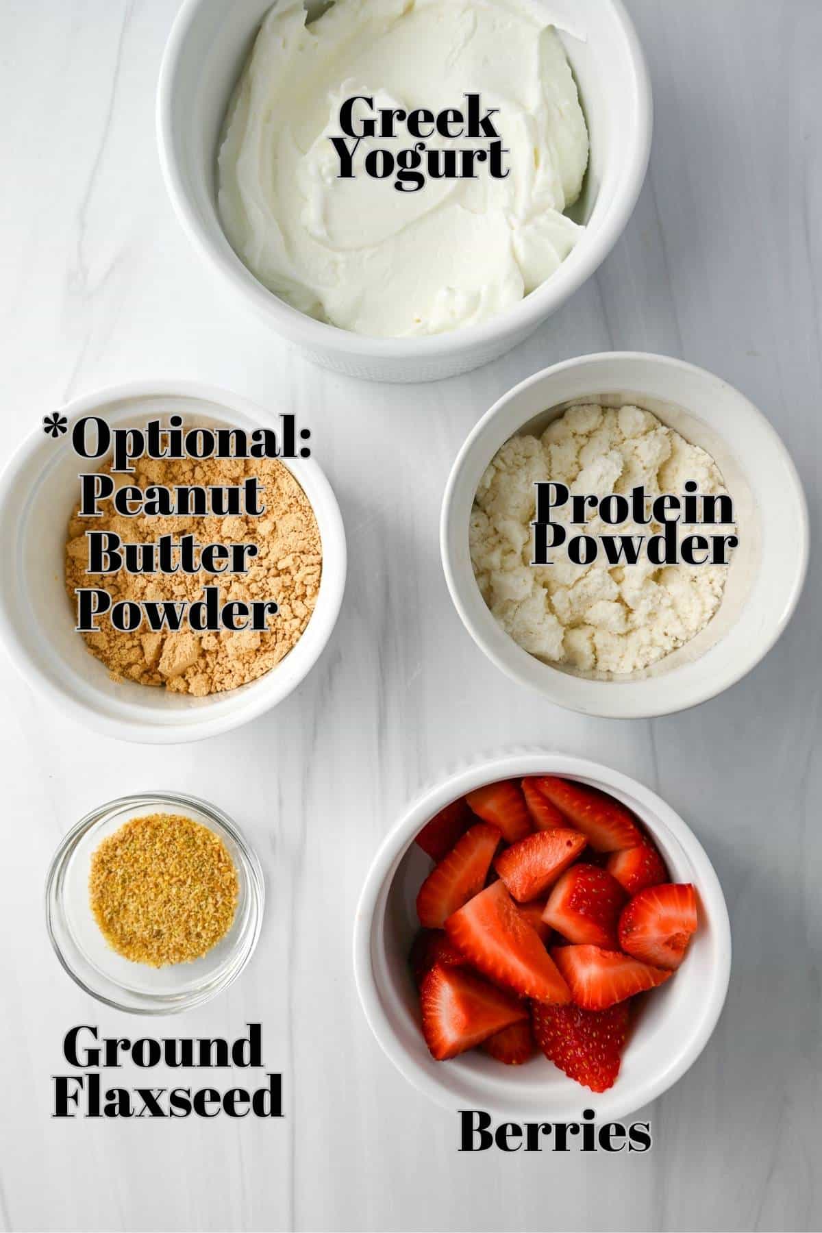 ingredients for making protein yogurt bowls measured out on a counter