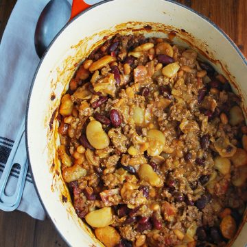 pot of beans with napkin and spoon for serving