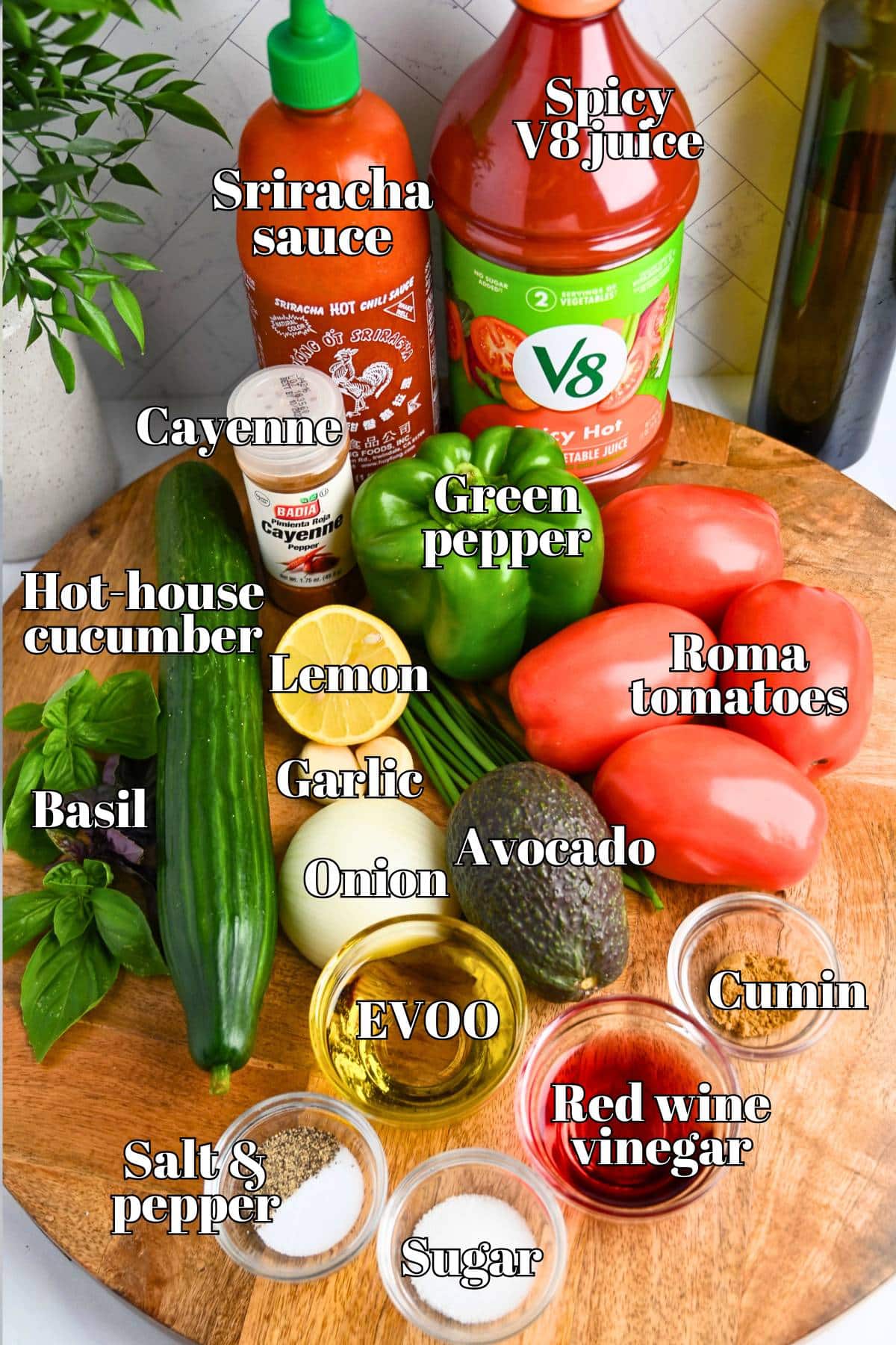 ingredients to make gazpacho with a spicy kick on a cutting board