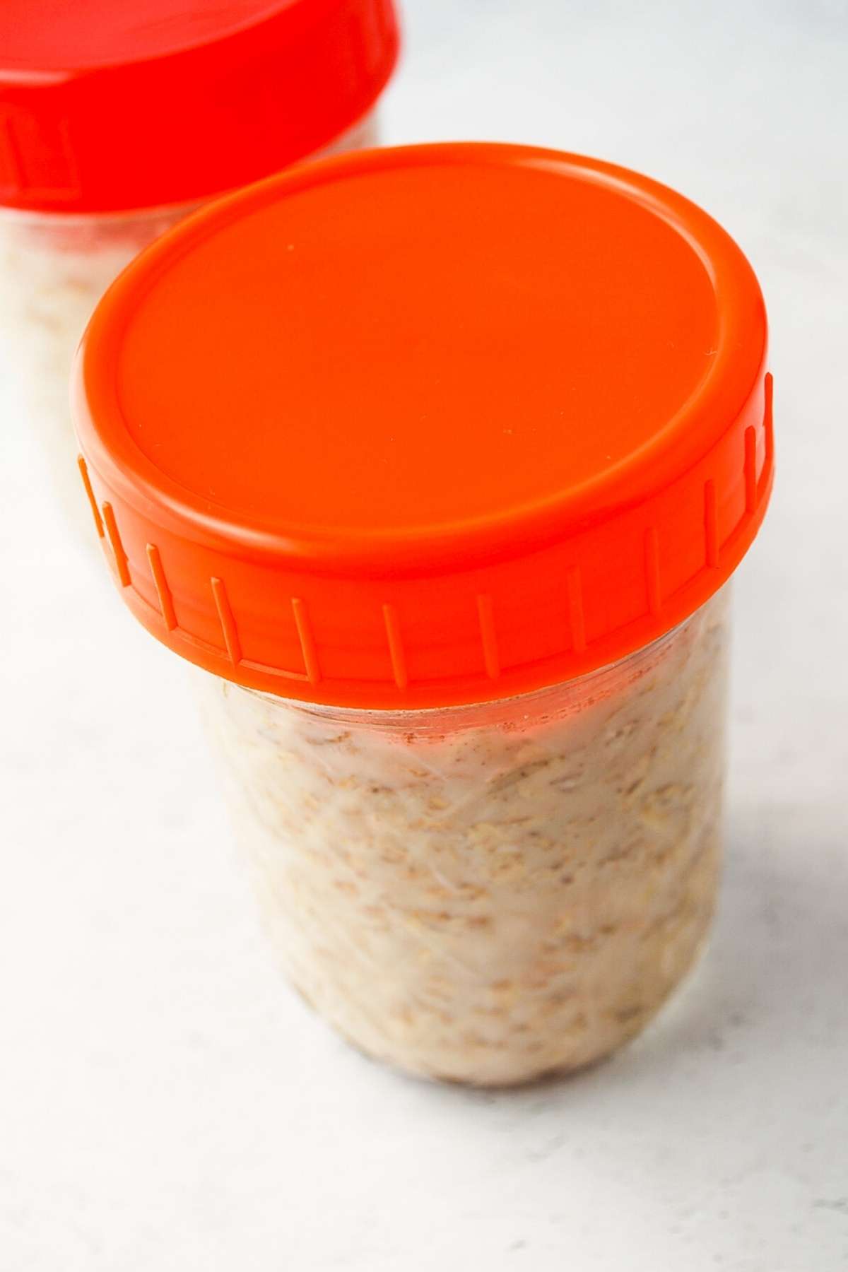 overnight oats in jars with orange lids