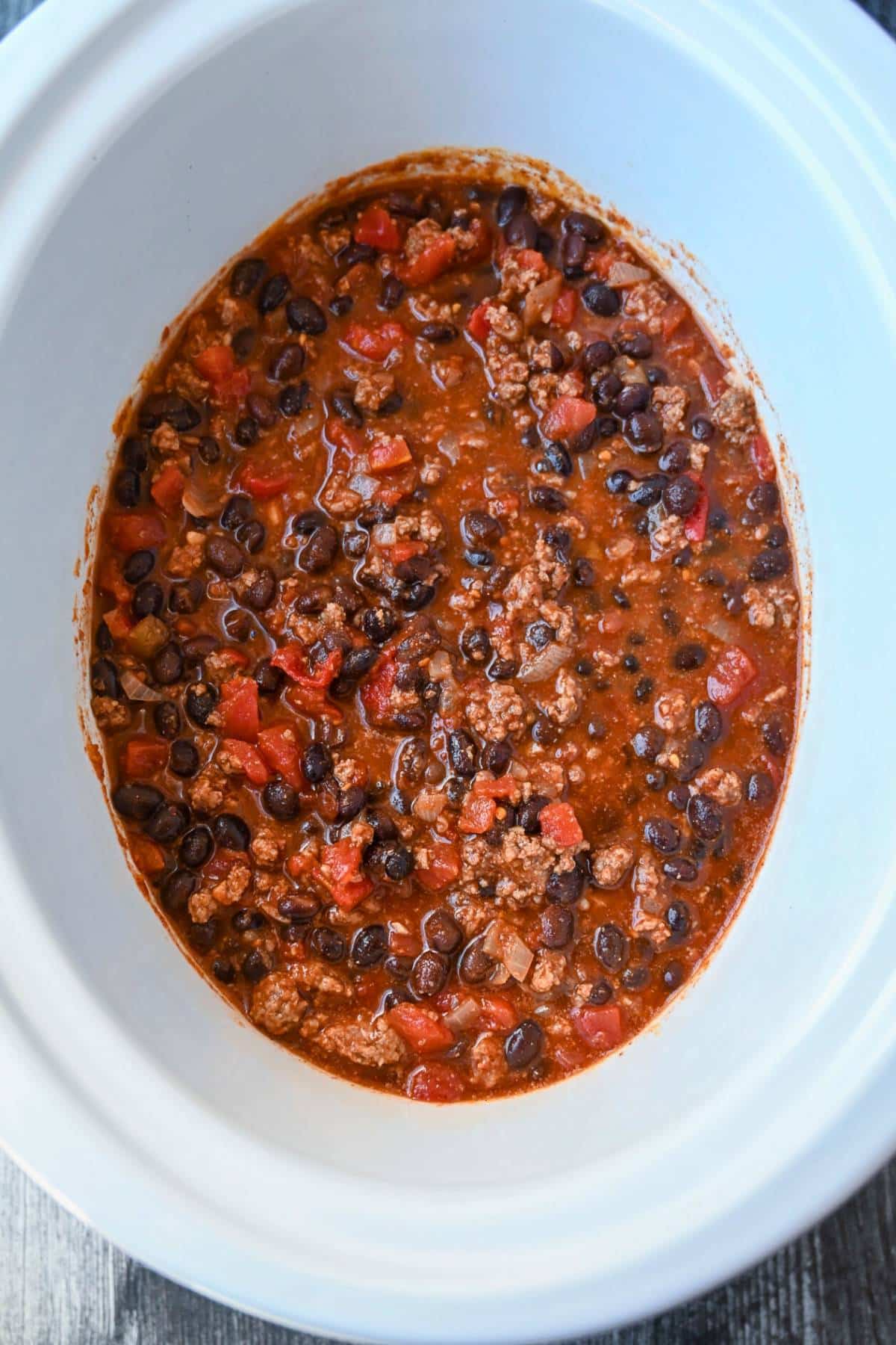 ingredients for chili in a slow cooker