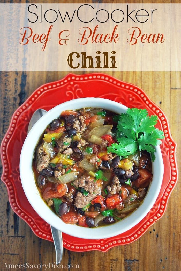 A slow cooker recipe for lean beef black bean chili that's easy to make and full of protein, fiber and vegetables for an easy healthy meal. via @Ameessavorydish