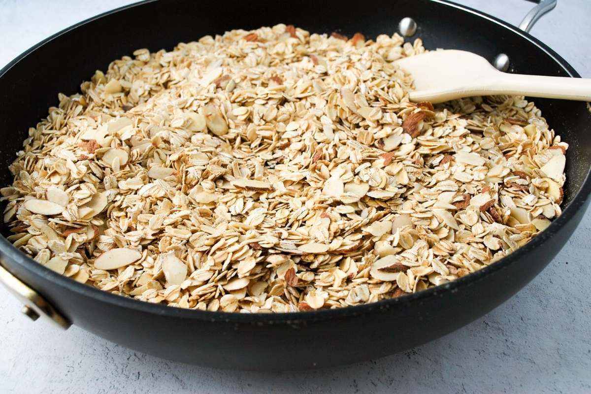 toasted oats and almonds in a skillet