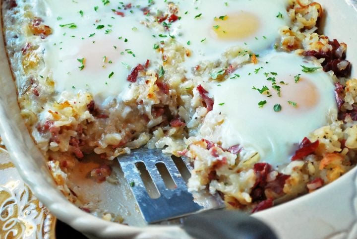 close up of casserole dish with serving spatula