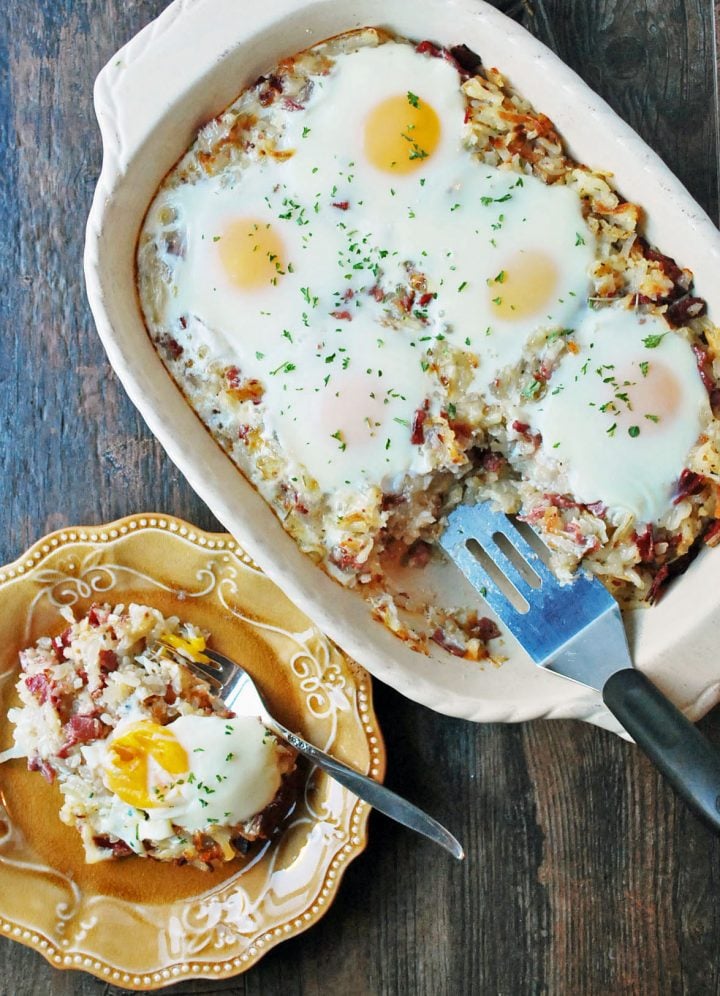 overhead shot of casserole dish with casserole on a plate with fork