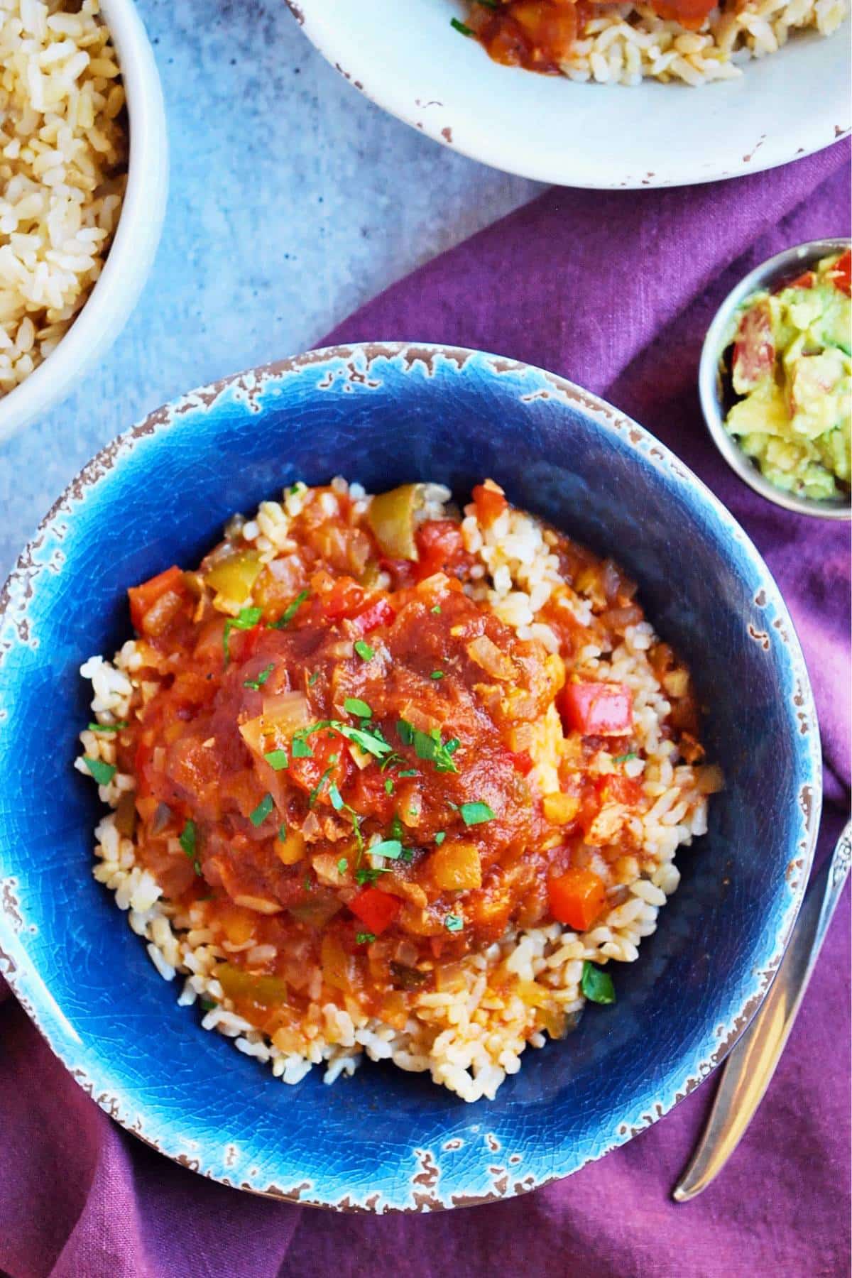 sweet and spicy salsa chicken in a bowl with rice