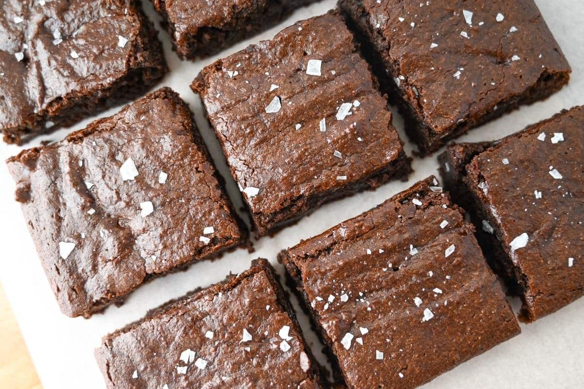 sliced tahini brownies with flaked salt on top