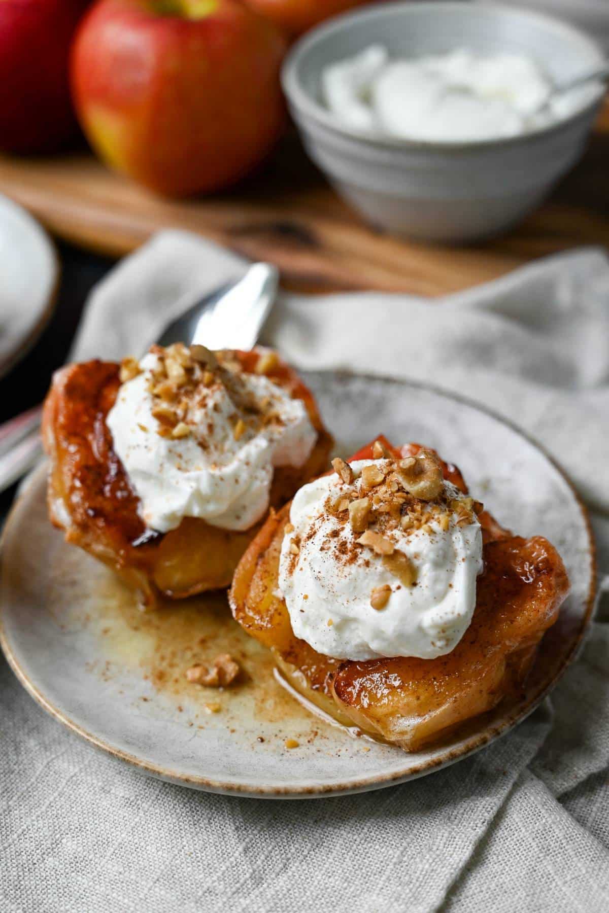 Enjoy maple cinnamon-spiced apples baked effortlessly in your air fryer. Serve with a scoop of Greek yogurt for the ultimate protein-packed treat! Oven instructions included. via @Ameessavorydish