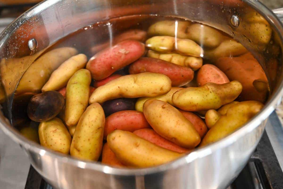 fingerling potatoes in a pot of cold water