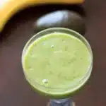 green smoothie in a wine glass