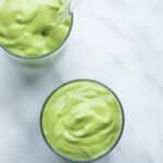 two smoothies in a glass