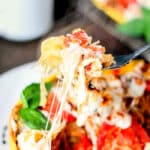 a bite of caprese stuffed spaghetti squash
