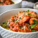 shrimp diavlo over spaghetti squash in a bowl