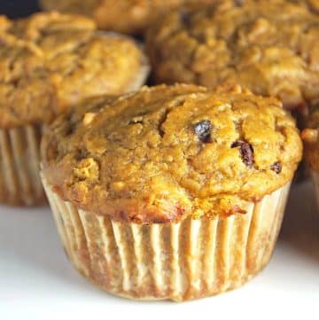 close up of a pumpkin banana muffin with chocolate chips