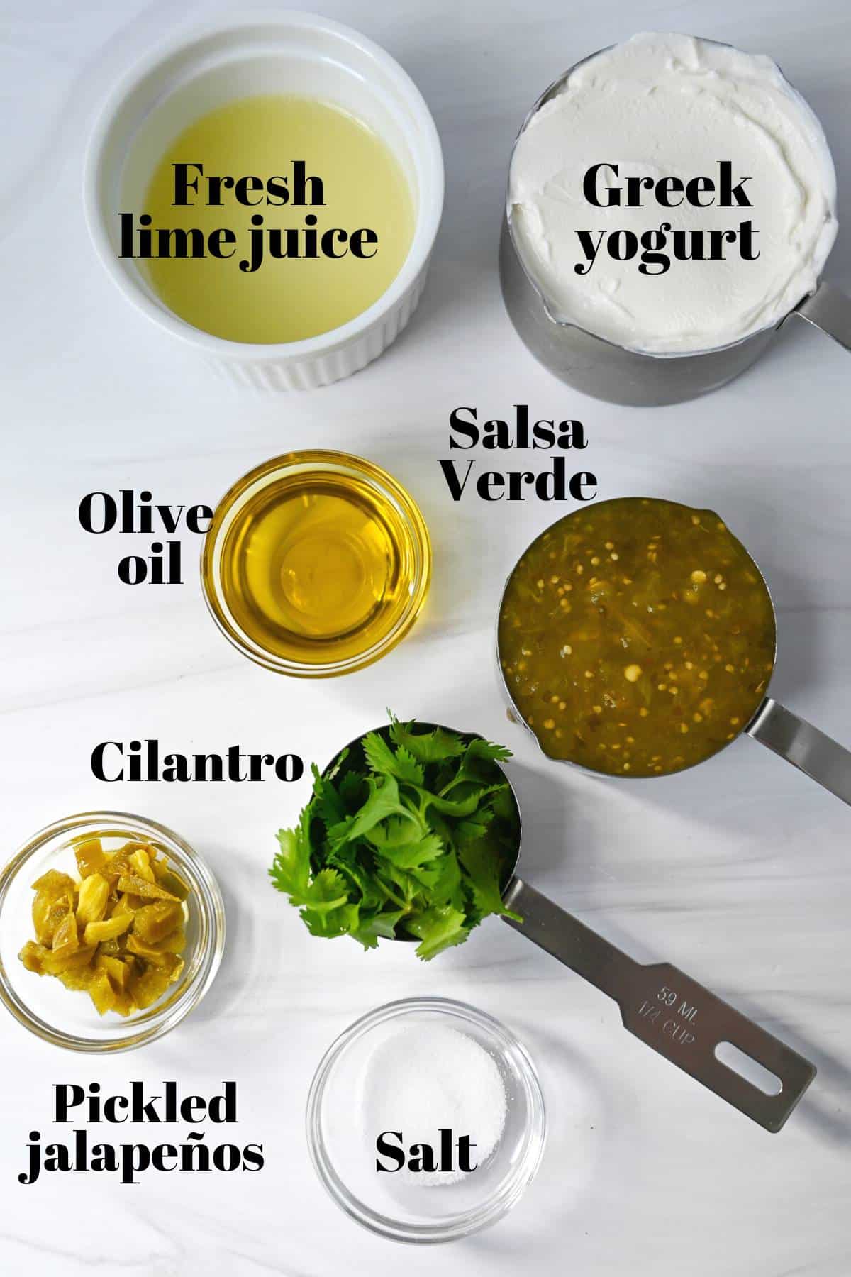 ingredients for cilantro lime dressing measured out on a counter